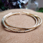 Three bright Brass cuff Bracelets - Art In Motion Jewelry & Metal Studio LLC